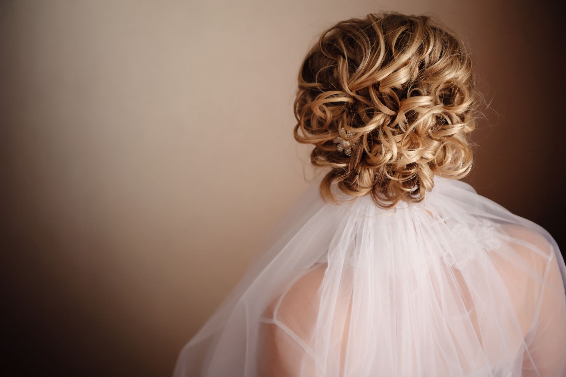 Bridal hair detail with pearl pins