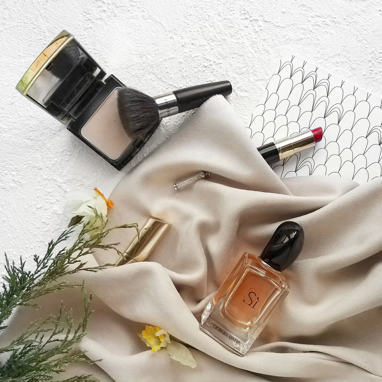 Makeup tools on crushed velvet